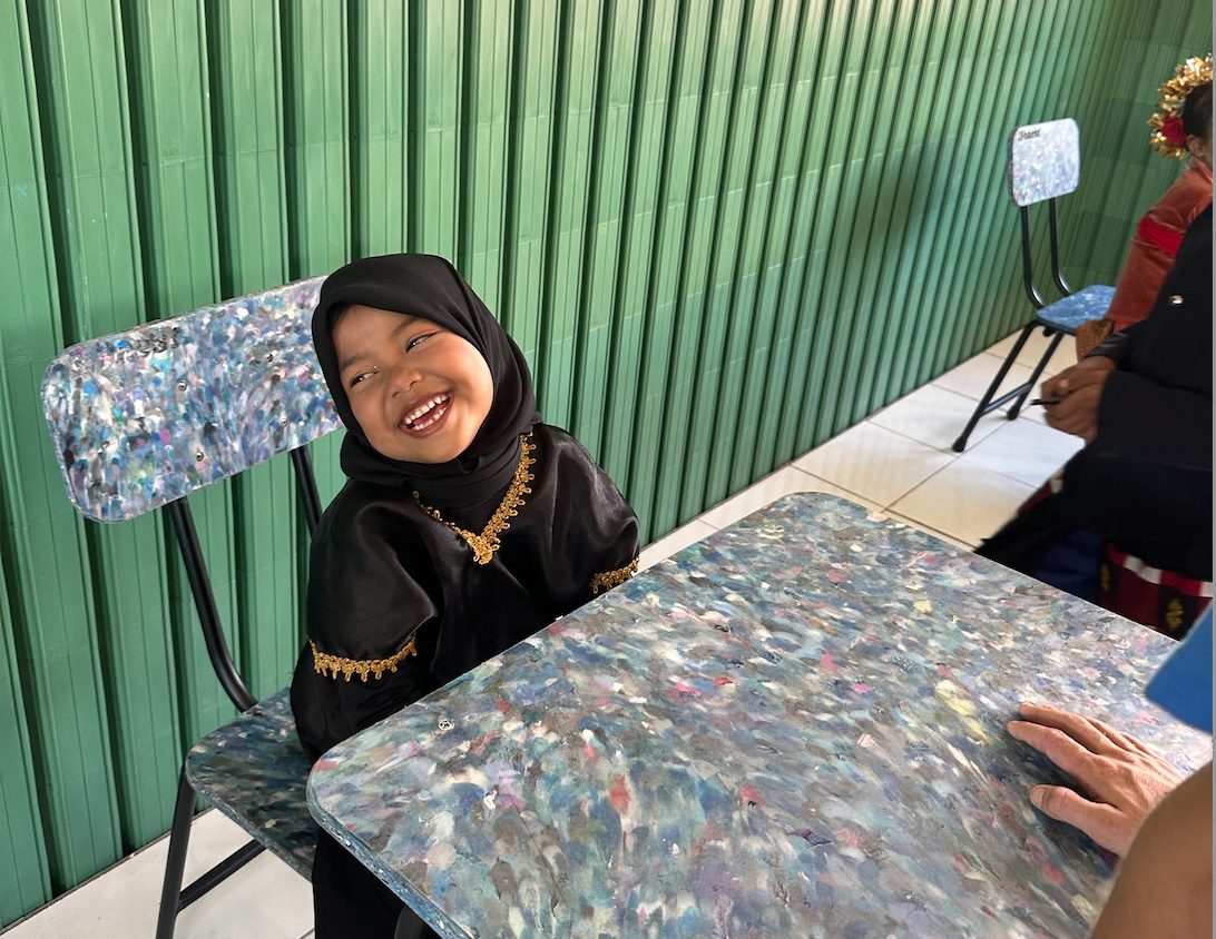 A finished desk in use — Honest classroom furniture, made from recovered plastic